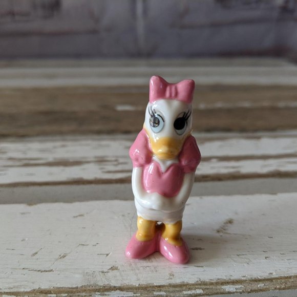 Disney Daisy duck figurine ceramic